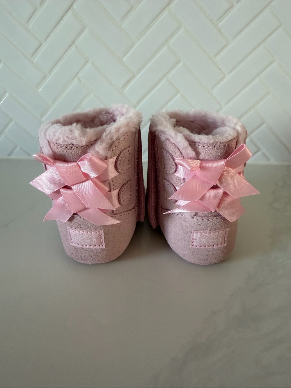 UGGS Pink Baby Bow Suede Booties